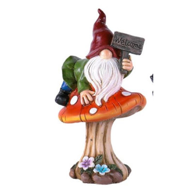 Statue gnome joye avec signe de bienvenue