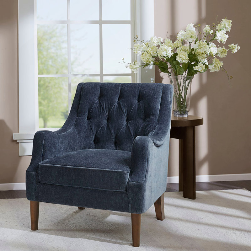 Fauteuil capitonné en polyester bleu marine à 4 pieds