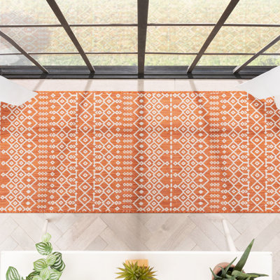 Tapis intérieur / extérieur orange Marshanna