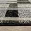 Tapis de couloir géométrique noir et ivoire 2 pi x 10 pi résistant aux taches