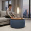 Repose-pieds rond avec rangement Dariyan-1029302364