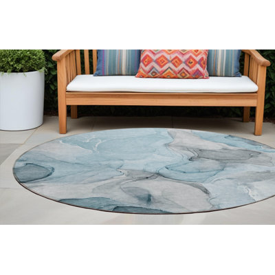 Tapis extérieur rond 8 pi