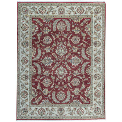 Tapis rouge et ivoire noué à la main de haute qualité