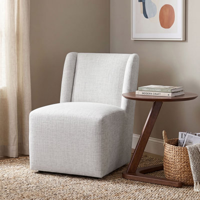 Chaise d'appoint à oreilles rembourrée avec roulettes Petasos