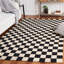 Tapis noir / beige Freesia-100502406