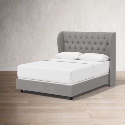 Tomey Upholstered Wingback Bed