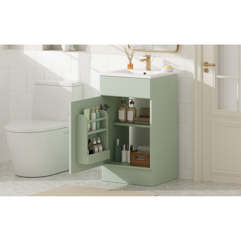 Meuble-lavabo autoportant vert clair avec lavabo en céramique, porte d'armoire à fermeture en douceur et rangement réglable à plusieurs niveaux pour les petites salles de bain