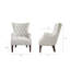 Fauteuil à oreilles capitonné Hannah