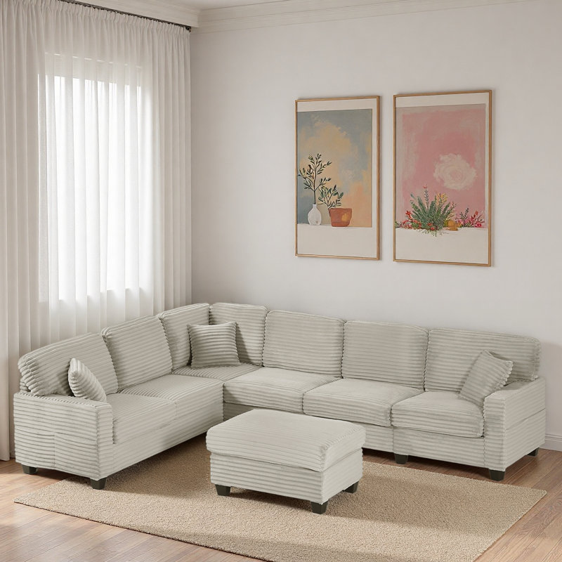 Canapé modulaire avec repose-pieds mobile et poches de rangement latérales