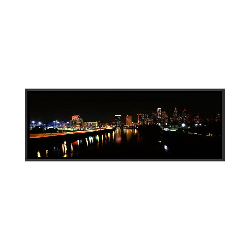 «Buildings Lit up at the Waterfront Schuylkill River, Pennsylvania», reproduction de photo sur toile, Toile avec cadre noir