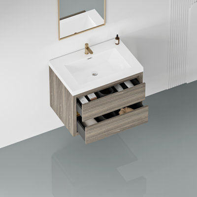 30" Bathroom Vanity With Sink. Ash Grey Floating Cabinet Materials. Pre-Assembled For Quick Installation. U-Shaped Interior Storage. Stone Resin Countertop. Smooth Soft Close Drawer Movement. Wooden