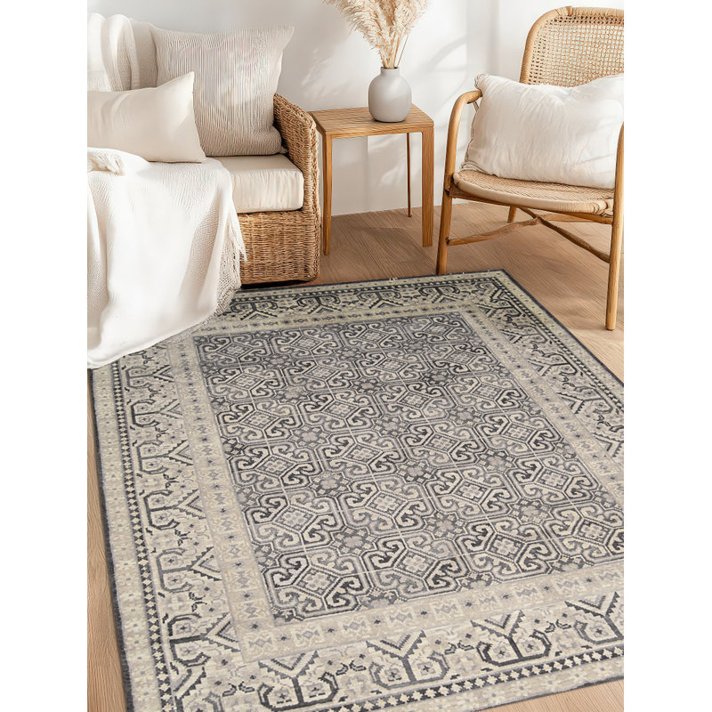 Tapis mauve en laine noué à la main