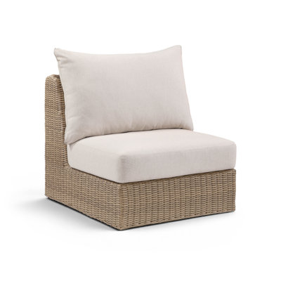 Fauteuil de patio extérieur en tissu et osier Delmos