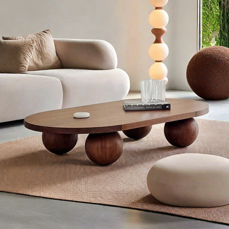 Table basse ovale en bois massif avec pieds ronds en chêne naturel