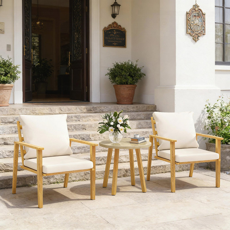 Ensemble bistro de style nordique 3 pièces avec fauteuils confortables et table ronde en acier, parfait pour les petits espaces extérieurs