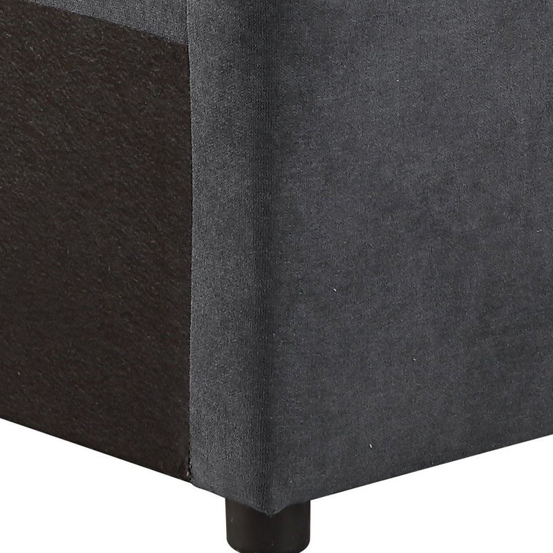 Canapé gris avec dossier élégant et polyvalent