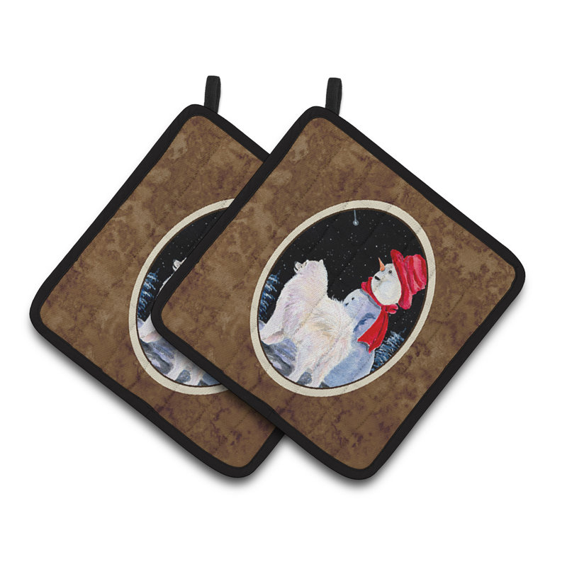 Samoyède et bonhomme de neige