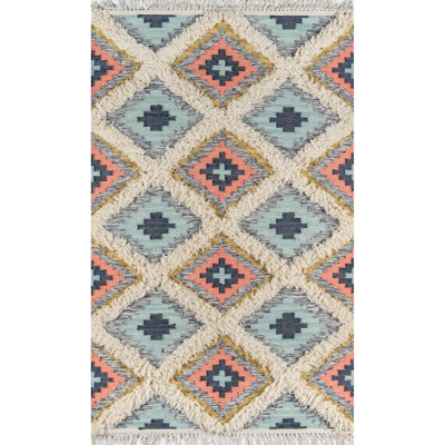 Tapis en laine fabriqué à la main de style sud-ouest Osiris en pêche / beige / bleu