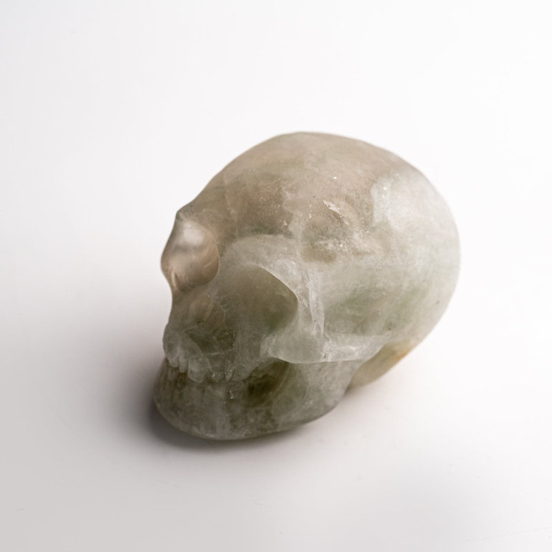 Polished Fluorite In Biotite Skull Carving (154 Grams)