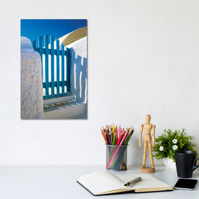 Greece, Santorini, Oia. Blue Gate Of Home. by Jaynes Gallery - Wrapped Canvas Print