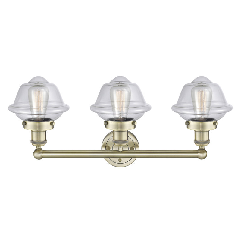 Éclairage pour meuble-lavabo à 3 lumières à intensité variable Grourke, Transparent, Laiton antique