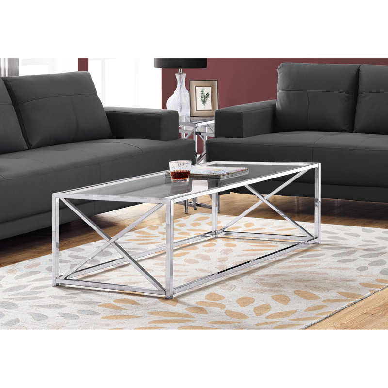 Table basse spacieuse rectangulaire: verre trempé transparent et table en métal poli avec base pour une utilisation polyvalente