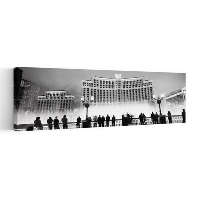 Hotel Lit Up At Night Bellagio Resort And Casino The Strip Las Vegas Nevada USA by Dan Merkel - Wrapped Canvas Panoramic Print