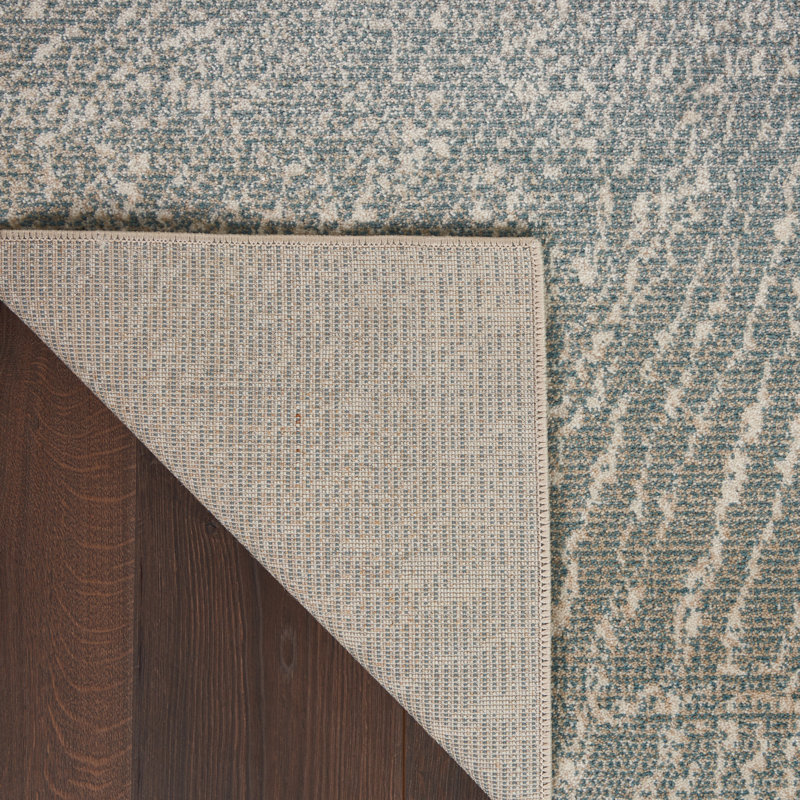 Abstract Elegance 70''x46'' Easy-Care Synthetic Area Rug in Grey
