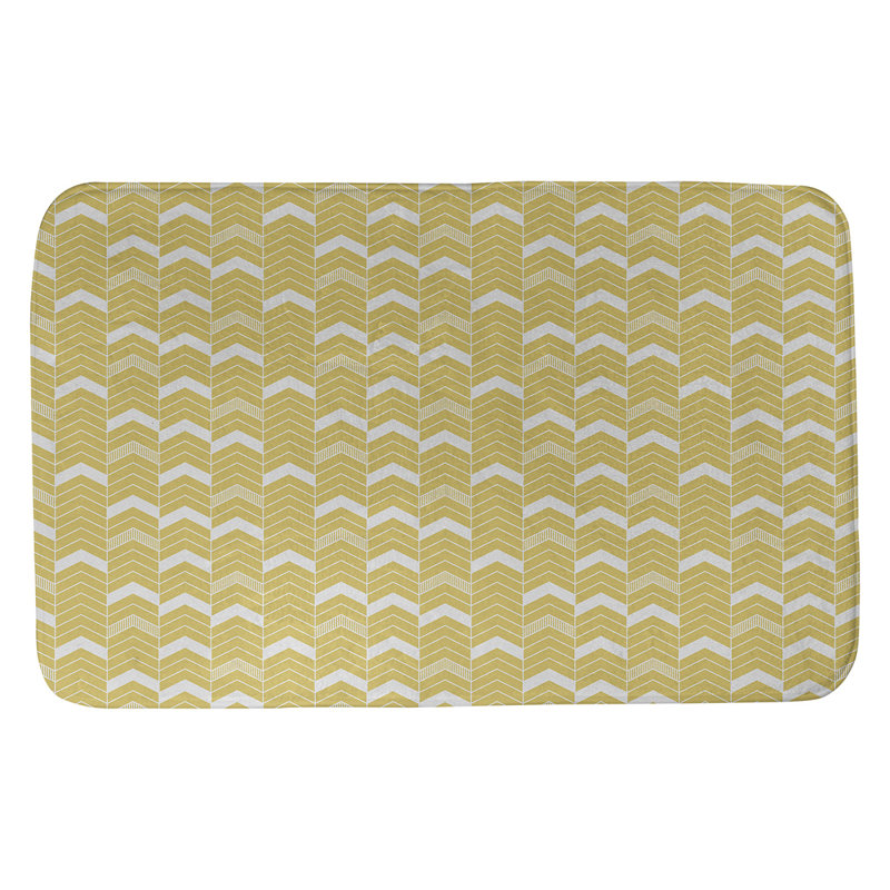 Tapis pour salle de bain lineed chevrons Stephenie, l 17 po x L 24 po, Jaune / Ivoire
