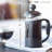 OVENTE French Press Coffee Maker 12 Ounce with Heat Resistant Borosilicate Glass & Stainless Steel 4-Level Filtration System, Portable Cold Brew Coffee Maker for Travel, Camping or Gift, Black FPT12B-14197464-14197460