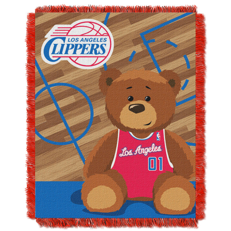 Jeté de bébé clippers half court NBA