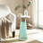 Glass and Wood Accent Table with Tapered Base and Modern Design