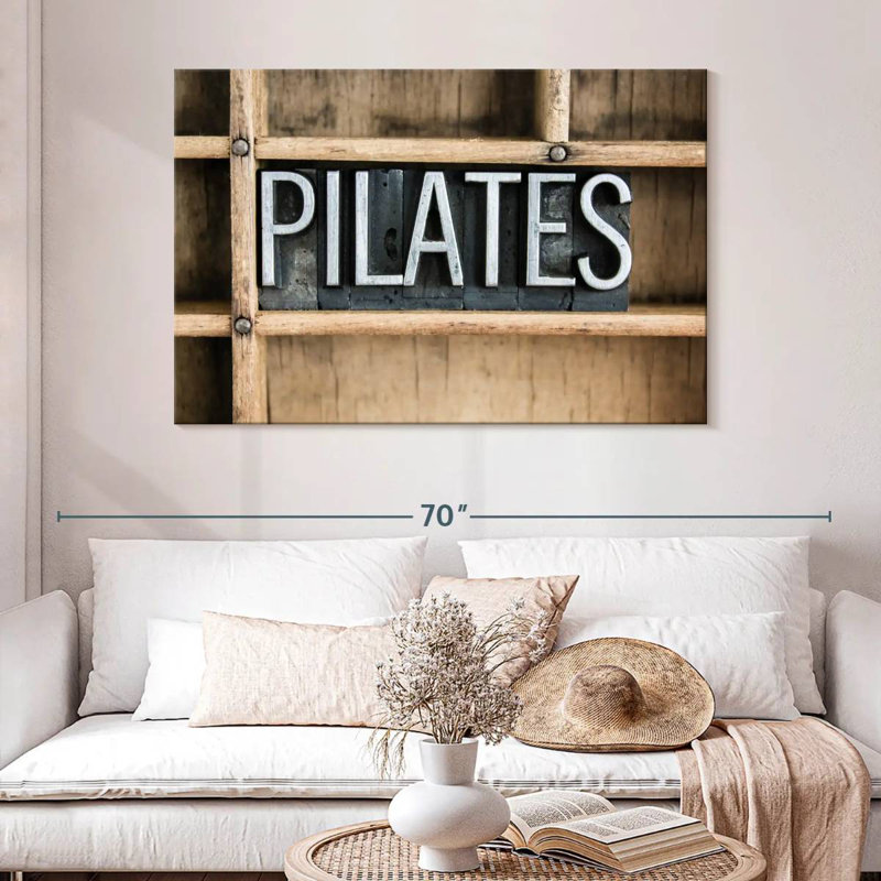 Pilates, typographie en métal