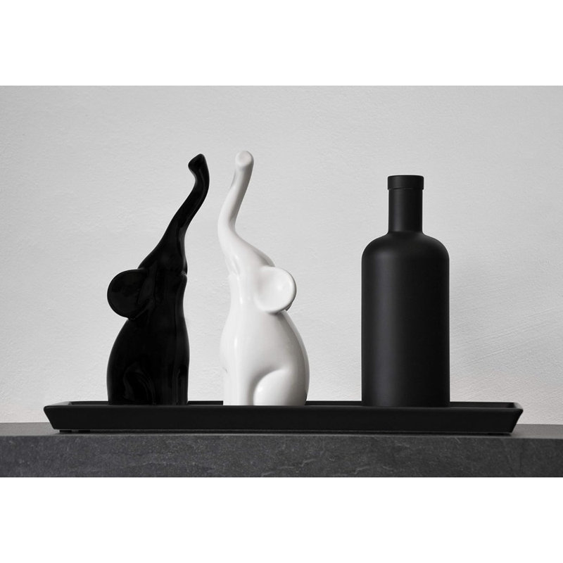 Paire d'éléphants aimants en sculpture moderne en céramique noire et blanche