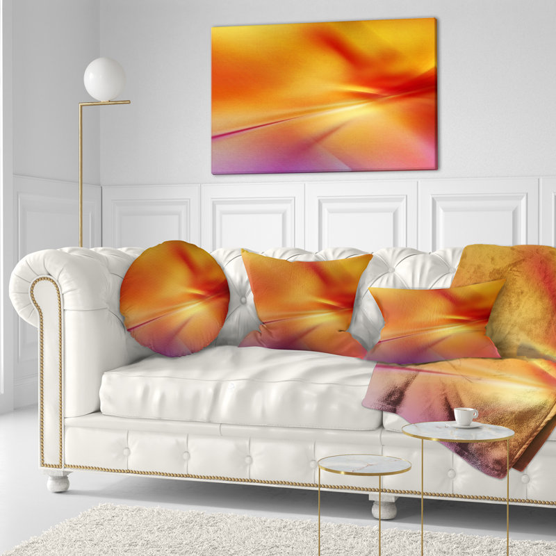 Coussin décoratif orange avec art abstrait rouge