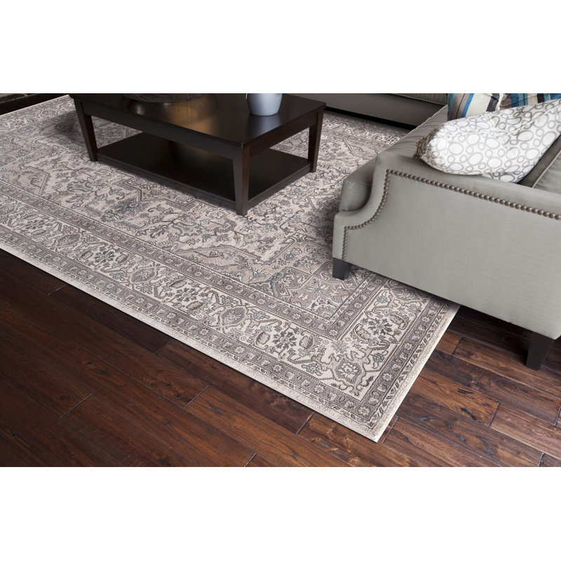 Ivory and Gray Synthetic Traditional Area Rug 6'7" x 9'3"
