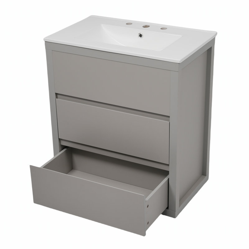 Meuble-lavabo moderne avec lavabo en céramique et tiroirs spacieux à extension complète, idéal pour les salles de bain élégantes et fonctionnelles.