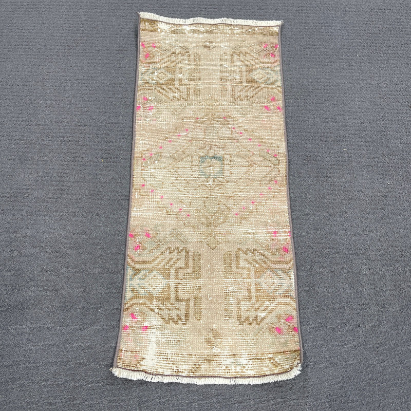 Tapis beige 15 x 35 pouces