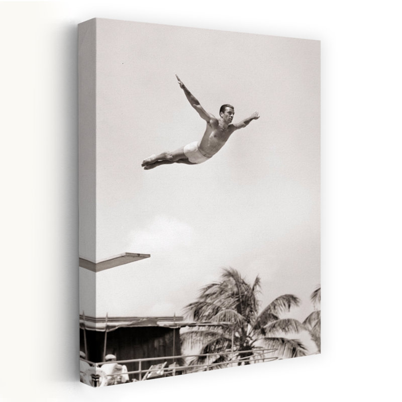1930s 1940s MAN HIGH DIVER JUMPING OFF RESORT SWIMMING POOL DIVING BOARD PERFECT FORM CAUGHT IN MID-AIR MIAMI BEACH FLORIDA USA by H. Armstrong Roberts - Wrapped Canvas Print