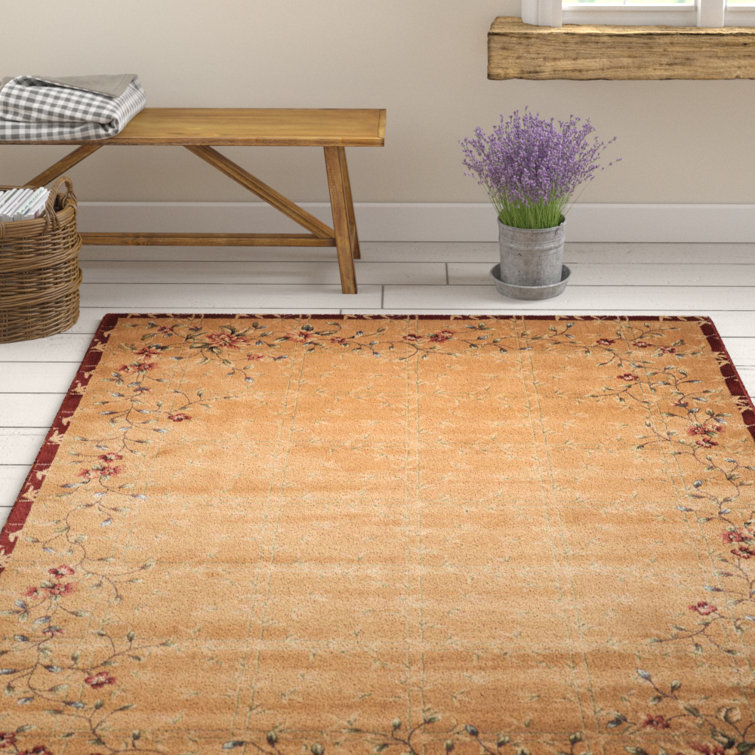 Tapis beige / rouge à motif floral Tibbett