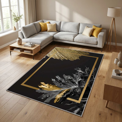 Glamorous Tropical Leaf Black and Gold Area Rug