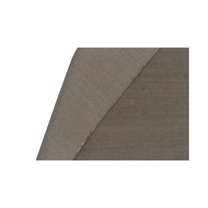 Dharma Area Rug in Tan