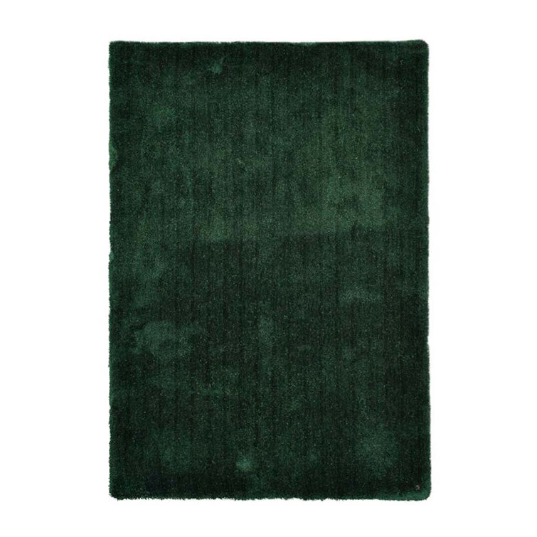 Handmade Cozy rug in dark green