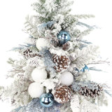 Holiday Tree with Ornaments and Pinecones in Decorative Vase