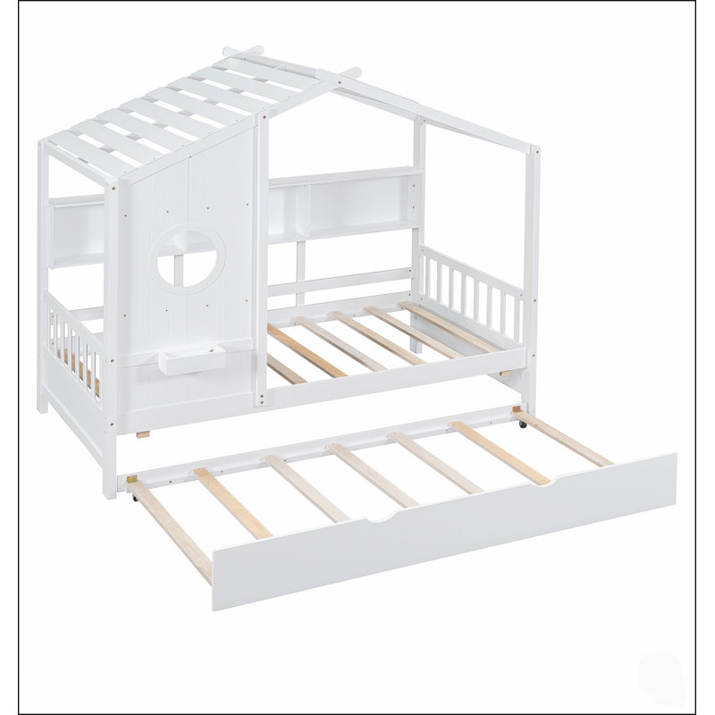 Lit cabane en bois pour enfants avec lit gigogne et étagères de rangement, idéal pour les chambres d'enfants et les jeux créatifs.