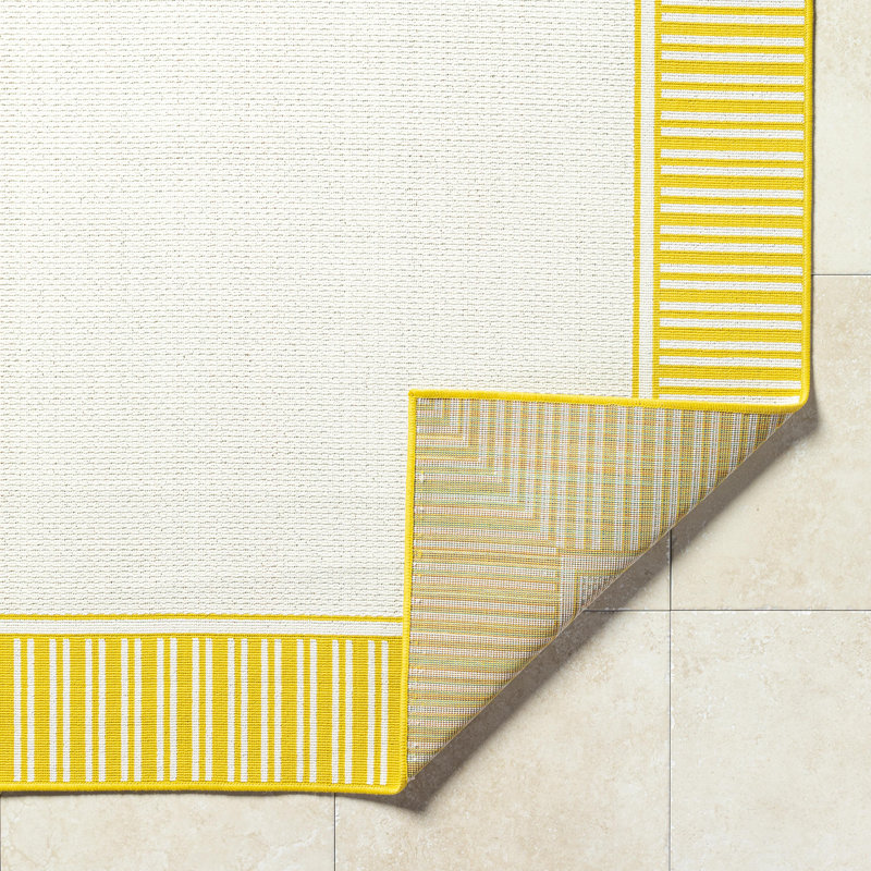 Derle Solid Color Machine Woven Natural Fibers Indoor / Outdoor Area Rug in Yellow, Rectangle 7'3" x 10'6"