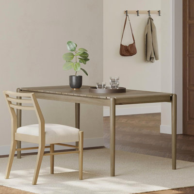Table de salle à manger de style moderne Mid-Century en frêne de 30,5 po. L 70,01 po x P 33,5 po. Fabriquée en bois stable avec des pieds fuselés ronds minces à la mode et un joli panneau à lattes. Table d'assemblage requise, H 30,5 po. Frêne