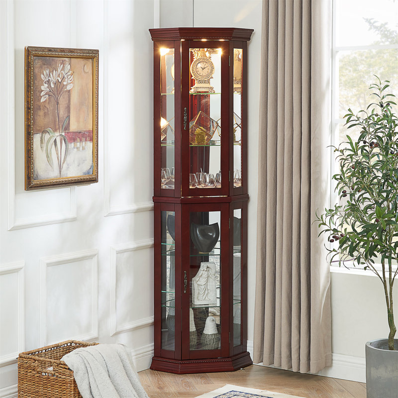 Vitrine de coin lumineuse avec tablettes réglables en verre et dossier en miroir pour une présentation élégante.