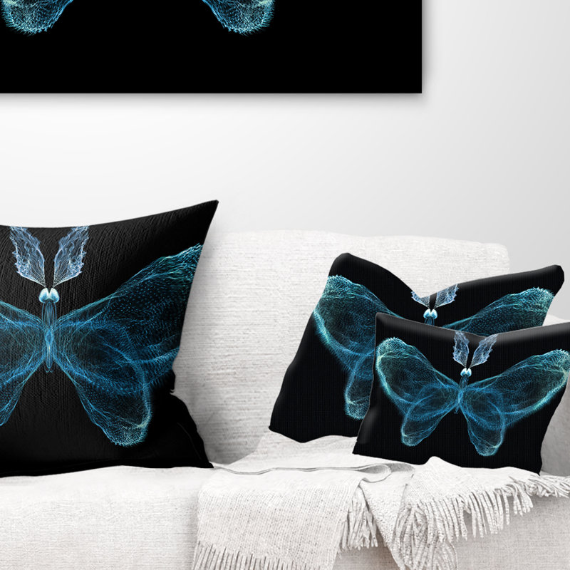 Coussin à imprimé floral turquoise