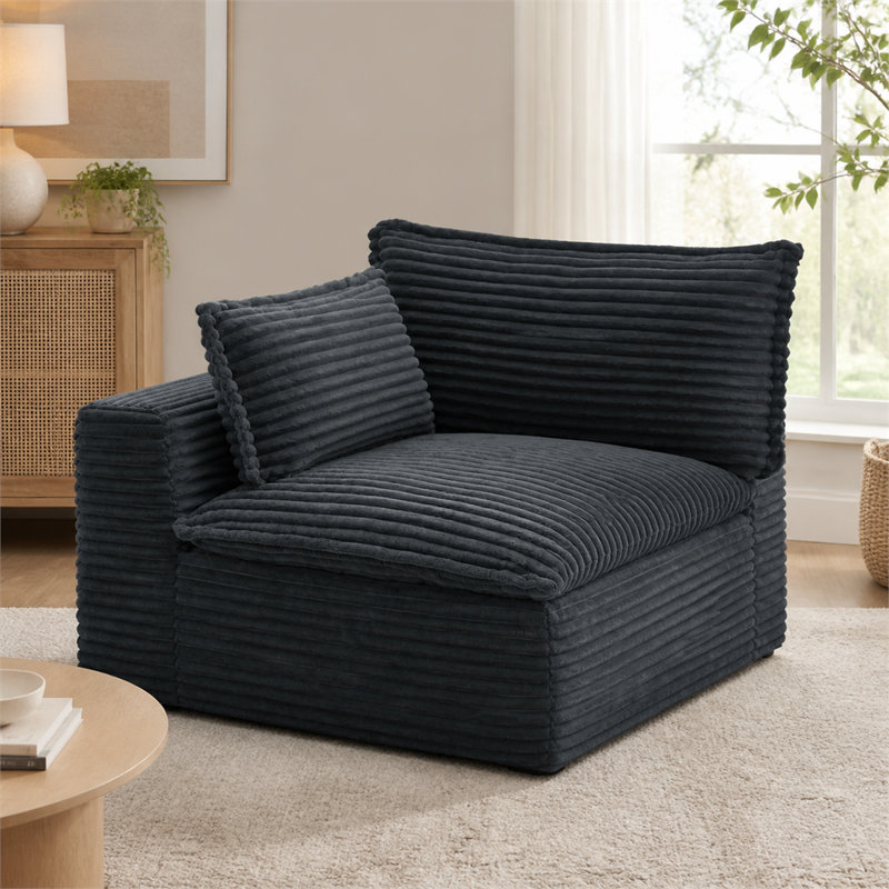 Canapé modulaire composé de mousse grise segmentée et emballé sous vide ; comprend un accoudoir droit permettant une configuration flexible — un fauteuil minimaliste, durable et décontracté, idéal pour le salon.